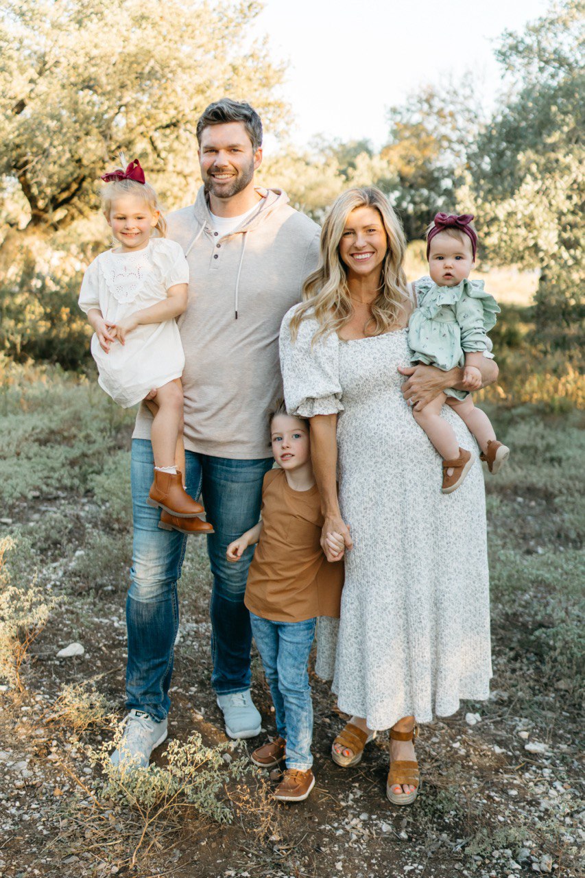 Tara Grant, lead wedding coordinator at Grant Your Wish Weddings, with her family